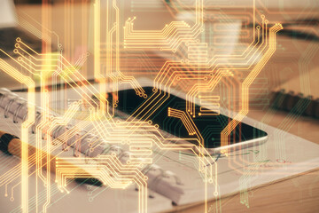Double exposure of tech theme sketch over cell phone background. Concept of technology