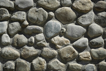 natural stone fence. texture. Stone. photo during the day.