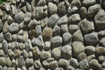 natural stone fence. texture. Stone. photo during the day.