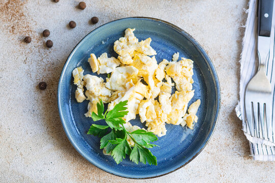 scrambled eggs scrumble egg fried fresh breakfast dish on the table healthy food meal snack copy space food background rustic. top view