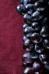 A bunch of black grapes close up
