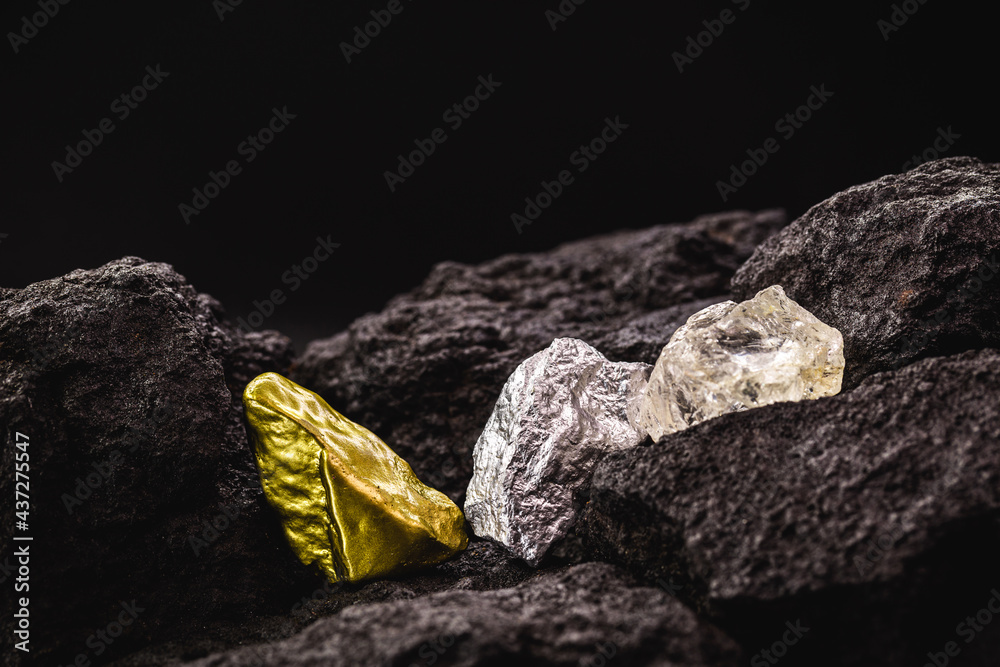 Sticker nugget of silver and gold stone and rough diamond, in mine, concept of precious stone mining or mineral extraction, mineralogy industry