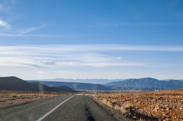 road trip through magnificent Atlas mountains landscape graphic layers of rock form seductive curves
