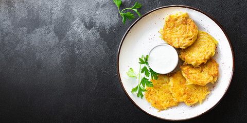 potato pancakes draniki vegetable dish fried potato cutlets fresh wholesome dish on the table healthy food meal snack copy space food background rustic