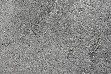 Gray texture background. Concrete wall. Rough surface. Stone texture. Uneven, scratched, lumpy.