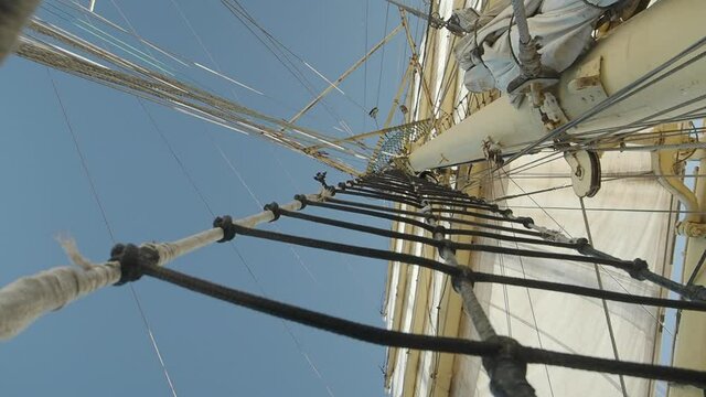 Mast with sails and shrouds on old sail ship - windjammer, bark
