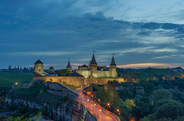 Fototapeta na wymiar View at dusk on Kamianets-Podilskyi Castle, Ukraine