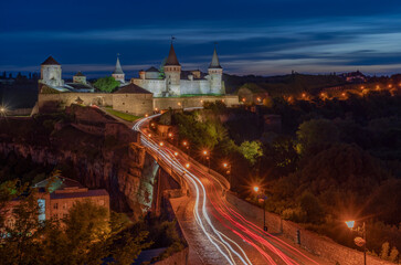 Fototapeta na wymiar View at dusk on Kamianets-Podilskyi Castle, Ukraine
