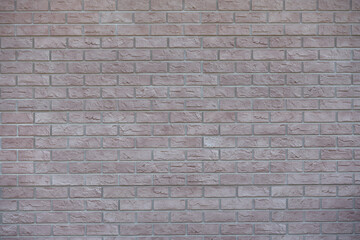 Texture brick wall from plastic panels for facade decoration