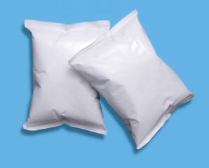 Plastic bag snack packaging over blue background