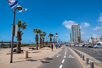  People sunbathes on the beach  in Tel Aviv, Israel
