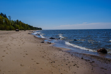 baltic sea beach with white sand and large rocks