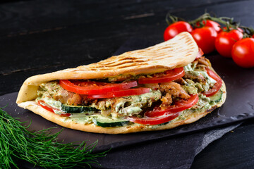 Kebab - grilled meat, bread and vegetables