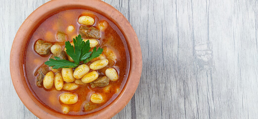 Delicious tomato sauce bean casserole.