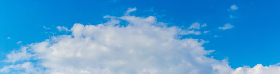Blue sky with big white cloud, panorama