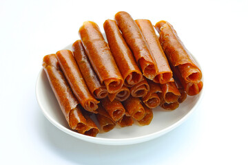 Dried mango paste on white background.