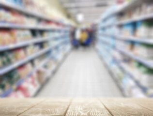 Empty table top on supermarket background for product presentation