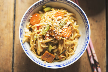 Pad thai tofu, pasta with tofu and vegetables, nuts