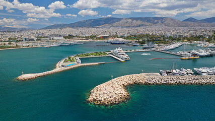 Aerial drone photo of luxury yachts and sail boats anchored in famous port and marina of Faliro or...