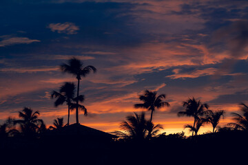 Shocking sunset with the sky full of colorful clouds. Concept of tranquility on vacation and Enjoy nature.