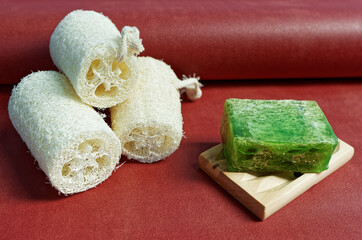 Soap with loofah sponge inside. Green glycerin soap with natural scrub.