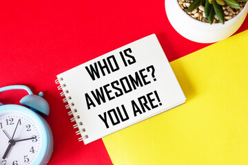 Who is cool You Positive affirmation and personal development concept. Written on a notepad and a...