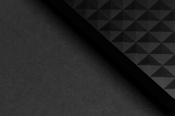 Black graphic parts and copy space on black background