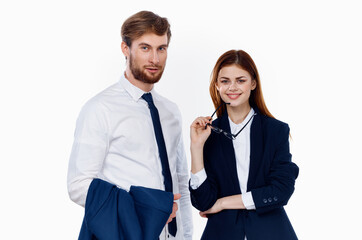man and woman in suits working office professional