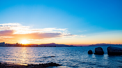Fototapeta na wymiar sunset at the beach of Florianópolis Island , Santa Catarina, Brazil, florianopolis
