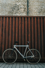 Artistic bicycle near wall