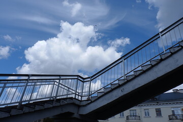 stairs with railings on a blue sky background