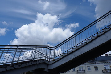 stairs with railings on a blue sky background