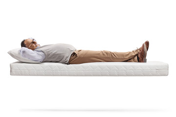 Mature man lying on a floating mattress