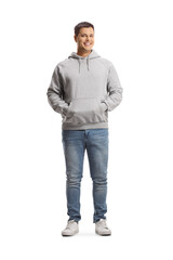 Full length portrait of a young man in a gray hoodie and jeans