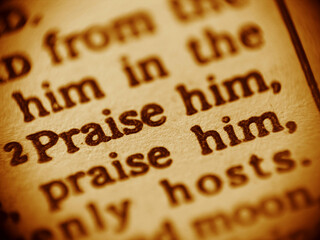 Macro shot of a Bible text focused on the words praise him. Sepia tone christian and jewish worship motif. with shallow DOF. - obrazy, fototapety, plakaty