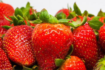 Some strawberries on a white background