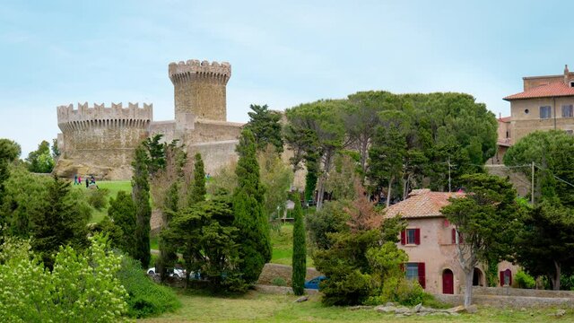 Etruscan city of Populonia known for necropoleis, old ruins, castle and sea. Populonia was an ancient Etruscan city near Baratti bay. 4K CINEMATIC CAMERA RAW FOOTAGE