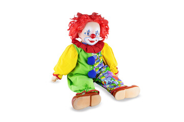Toy clown in multicolored costume, isolated on white background.