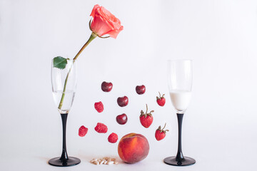 cherry, peach, raspberry, strawberry on white background