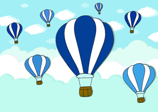 Blue hot air balloons in sky