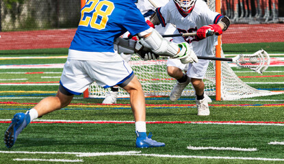 Lacrosse player shooting the ball during a game
