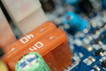 Blue PCB with SMD Components including fuses Macro Photo