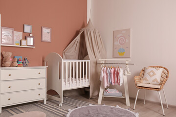 Baby room interior with stylish furniture and comfortable crib © New Africa