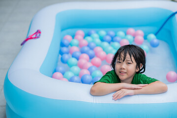 kid swimming at the pool, happy time