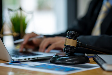 Consultation and conference of professional businesswoman and Male lawyers working and discussion having at law firm in office. Concepts of law, Judge gavel with scales of justice