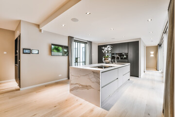 Home interior design of modern loft apartment with open kitchen in minimalist style