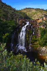 Fototapeta na wymiar Scenic Cachoeira da Serra Morena waterfall on the rocky landscape of Serra do Cipó range, Minas Gerais, Brazil 