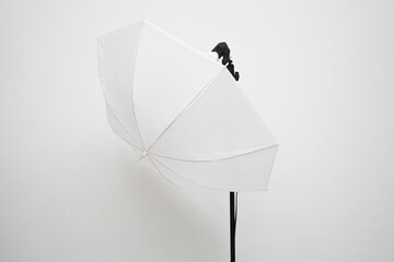 single umbrella for photography. full equipment for studio photography. creative project for...