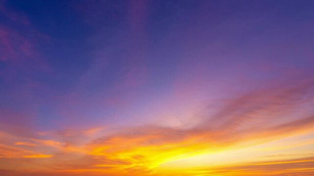 4K Time lapse of Majestic sunset or sunrise landscape Amazing light of nature cloudscape sky and Clouds moving away rolling 4k colorful dark sunset clouds Footage timelapse