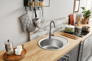 Sink in interior of modern kitchen